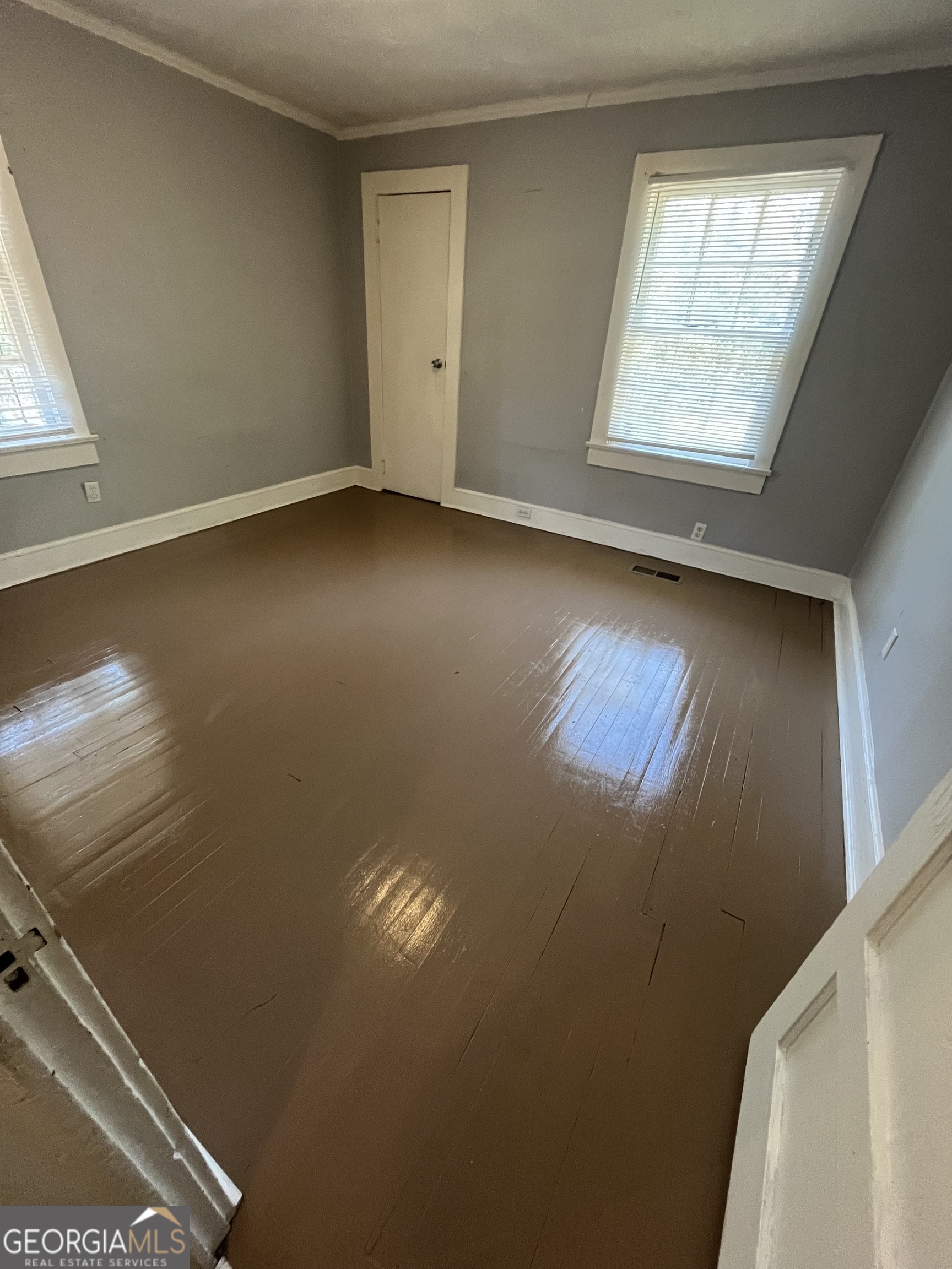 3423 Flamingo Drive Macon, GA 31206 - Photo 6 of 6 a view of an empty room and window
