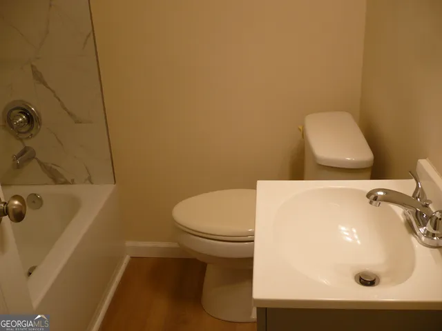 a bathroom with a sink and a toilet