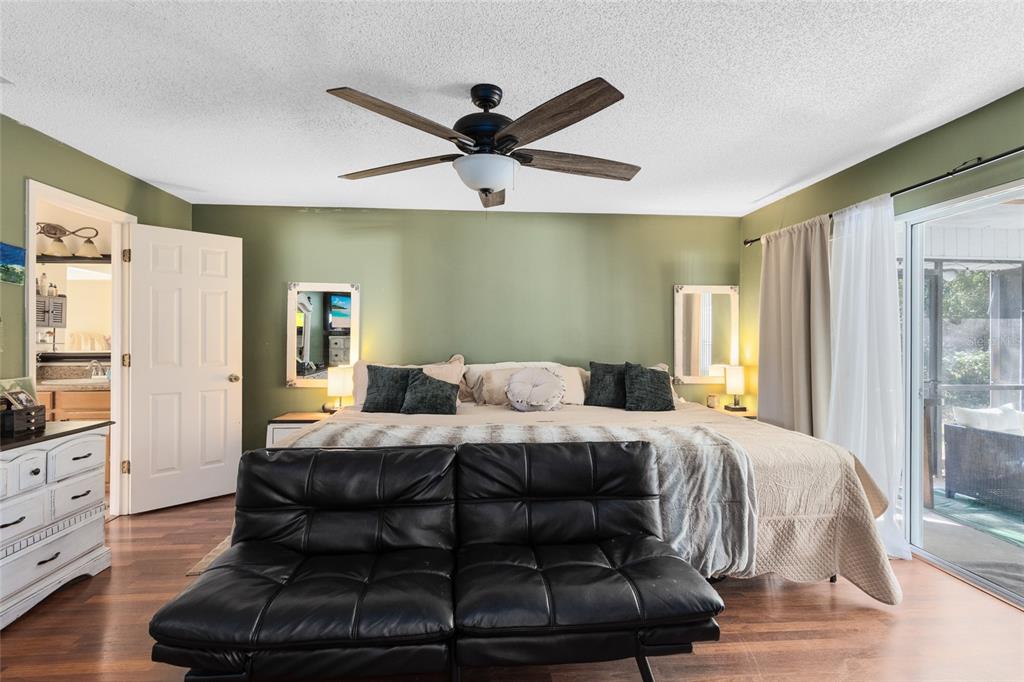 130 Laurianne Road DeBary, FL 32713 - Photo 17 of 34 a bedroom with a bed and window