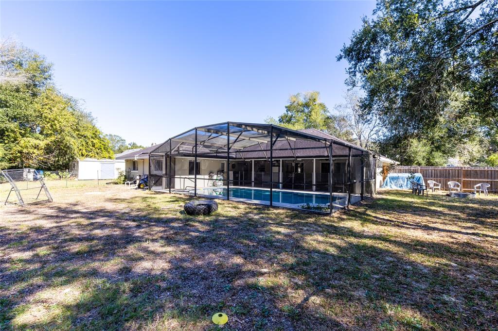 130 Laurianne Road DeBary, FL 32713 - Photo 29 of 34 a view of a house with a yard