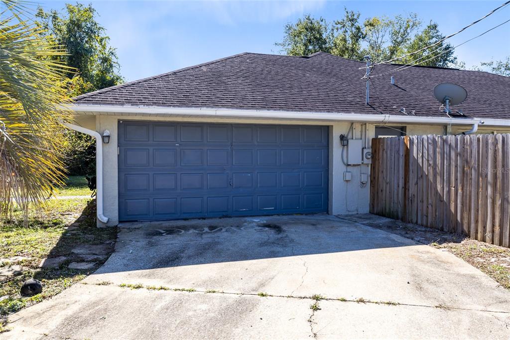 130 Laurianne Road DeBary, FL 32713 - Photo 3 of 34 a view of backyard with potted plants