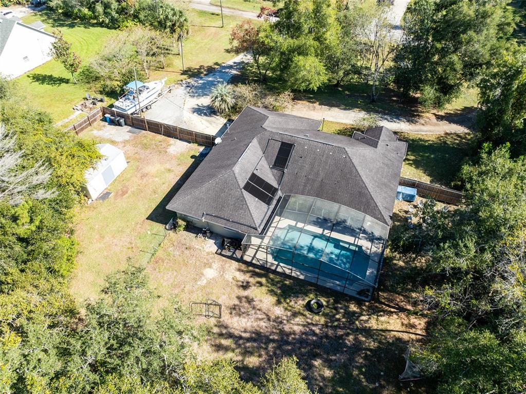 130 Laurianne Road DeBary, FL 32713 - Photo 32 of 34 a view of yard with swimming pool