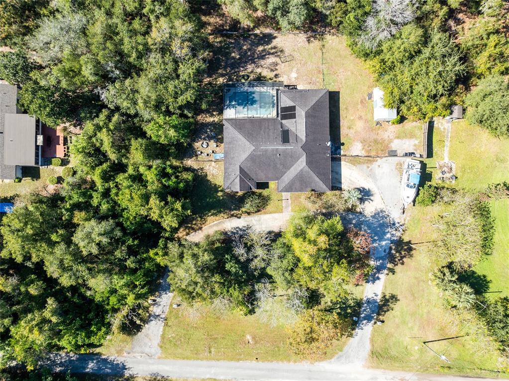 130 Laurianne Road DeBary, FL 32713 - Photo 34 of 34 an aerial view of a house with a yard