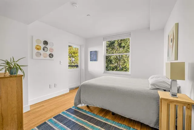 a kitchen with a refrigerator a stove top oven a sink and dishwasher