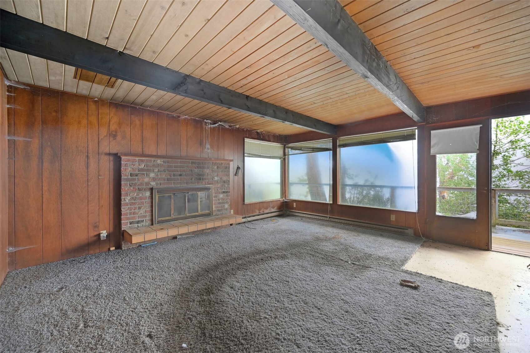 1284 Dines Point Road Greenbank, WA 98253 - Photo 14 of 23 a view of an empty room with a fireplace