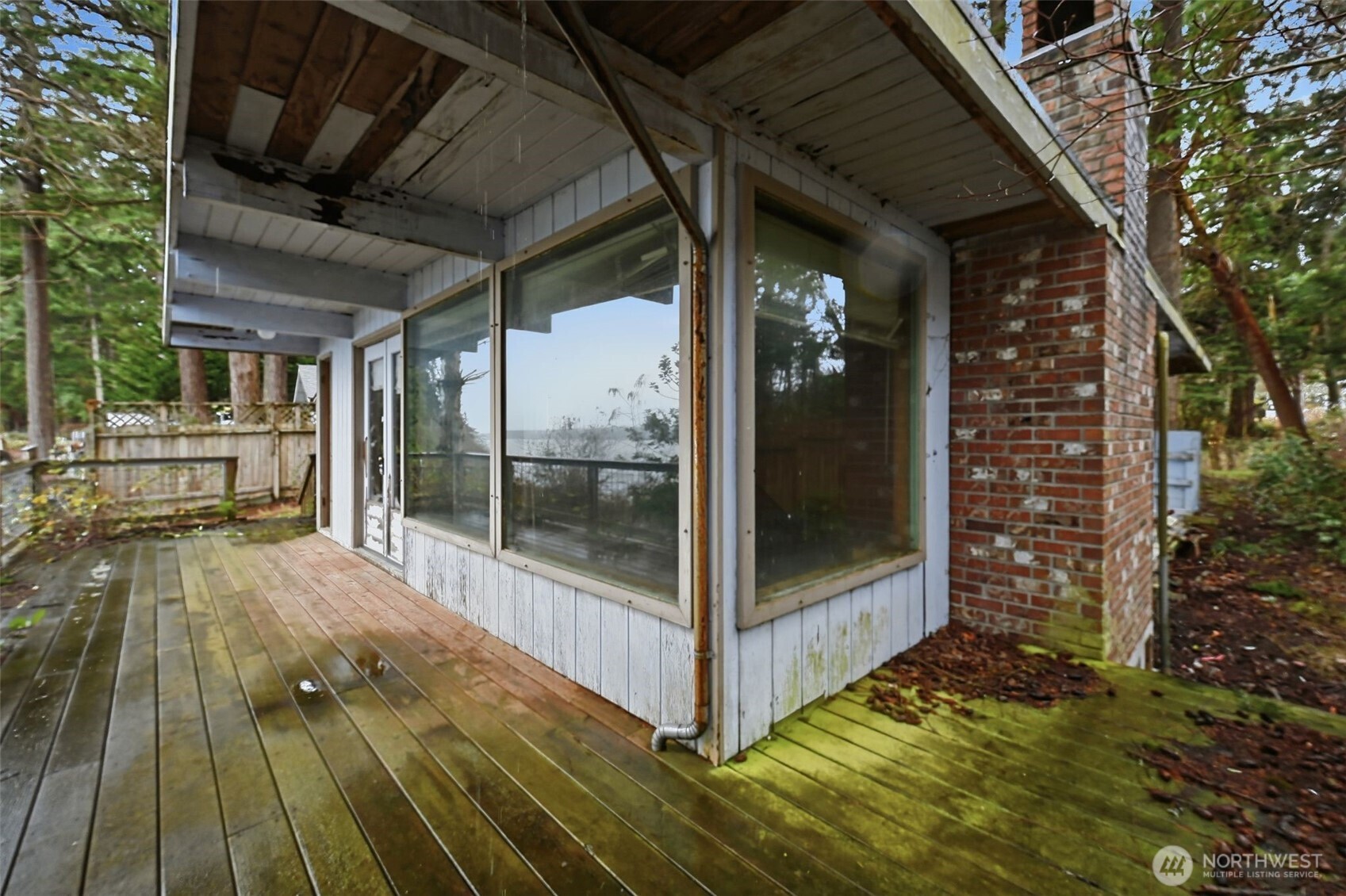 1284 Dines Point Road Greenbank, WA 98253 - Photo 4 of 23 a view of a balcony with door