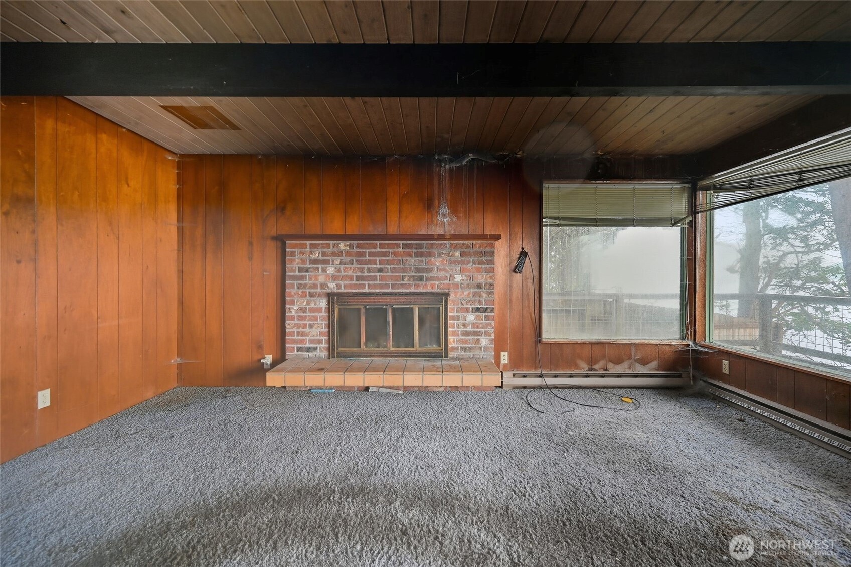 1284 Dines Point Road Greenbank, WA 98253 - Photo 10 of 23 a view of empty room with a fireplace