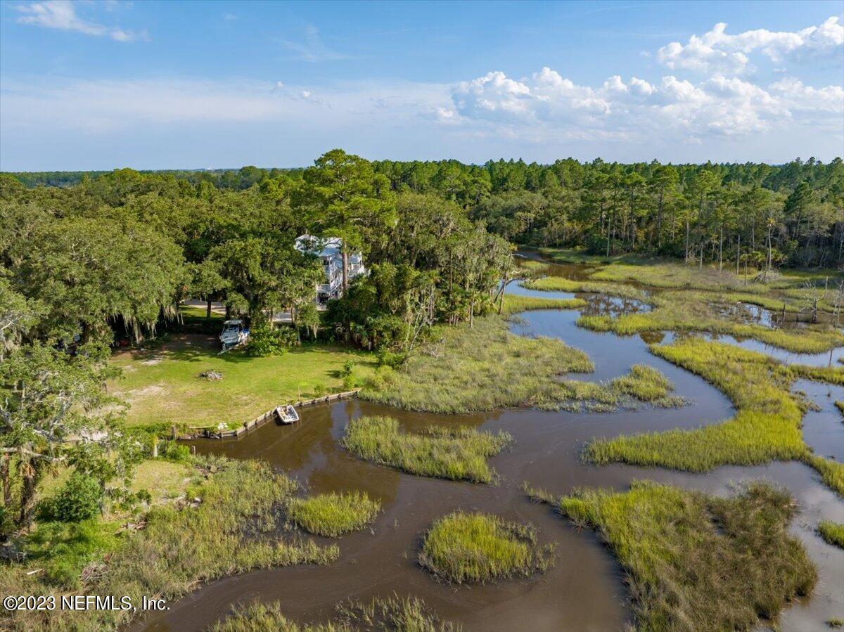 7145 Fitzpatrick Lane Jacksonville, FL 32226 - Photo 10 of 42 a view of a lake with a yard