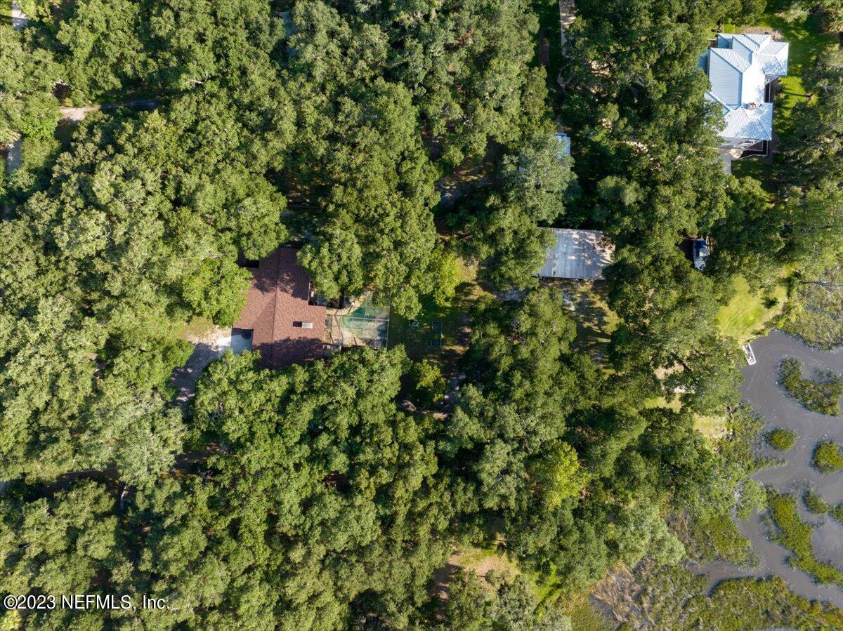 7145 Fitzpatrick Lane Jacksonville, FL 32226 - Photo 15 of 42 a view of a house with a tree
