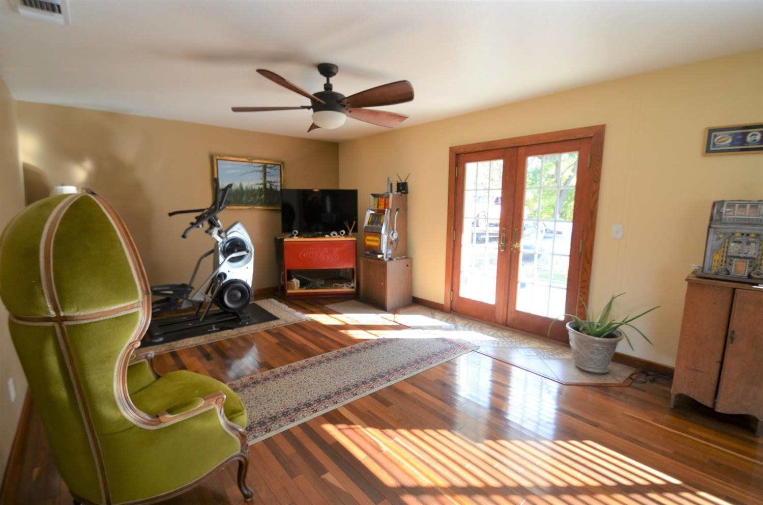 7453 Live Oak Drive Sanger, CA 93657 - Photo 12 of 28 a living room with furniture and a wooden floor