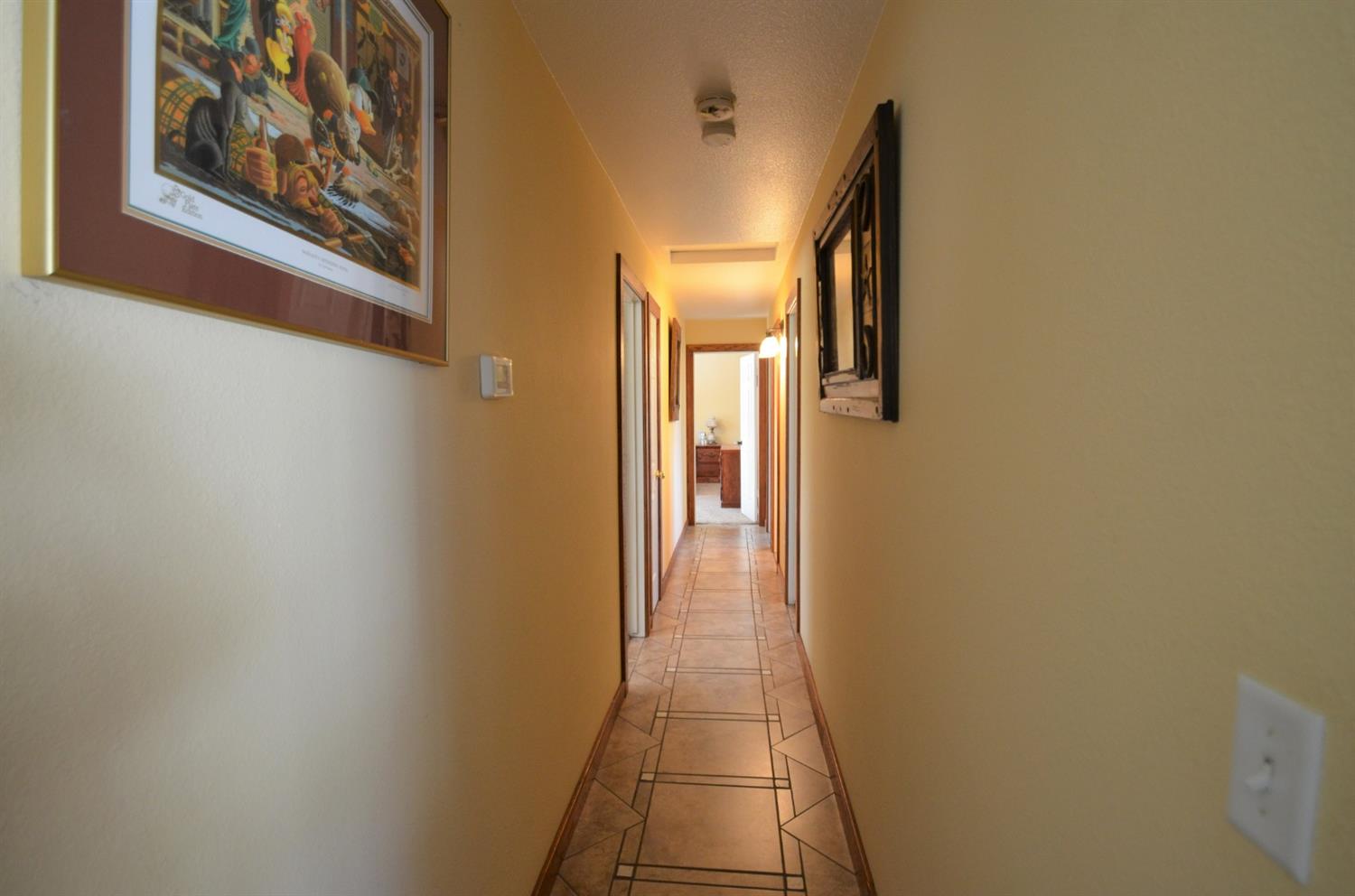 7453 Live Oak Drive Sanger, CA 93657 - Photo 15 of 28 a view of a hallway