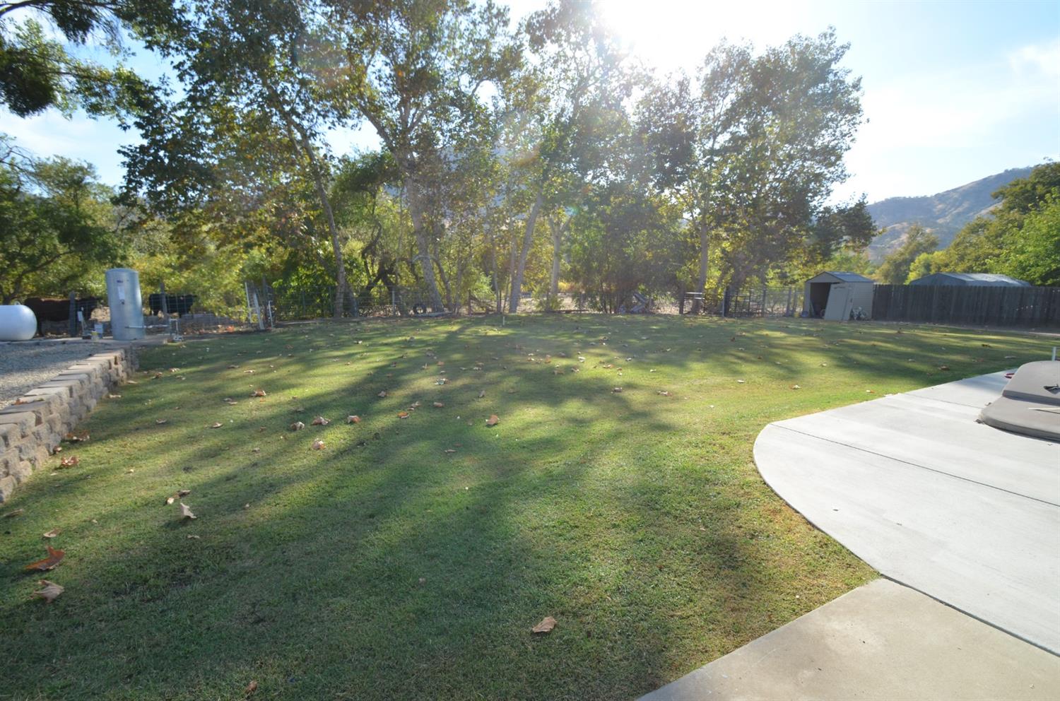7453 Live Oak Drive Sanger, CA 93657 - Photo 22 of 28 a house view with a garden space