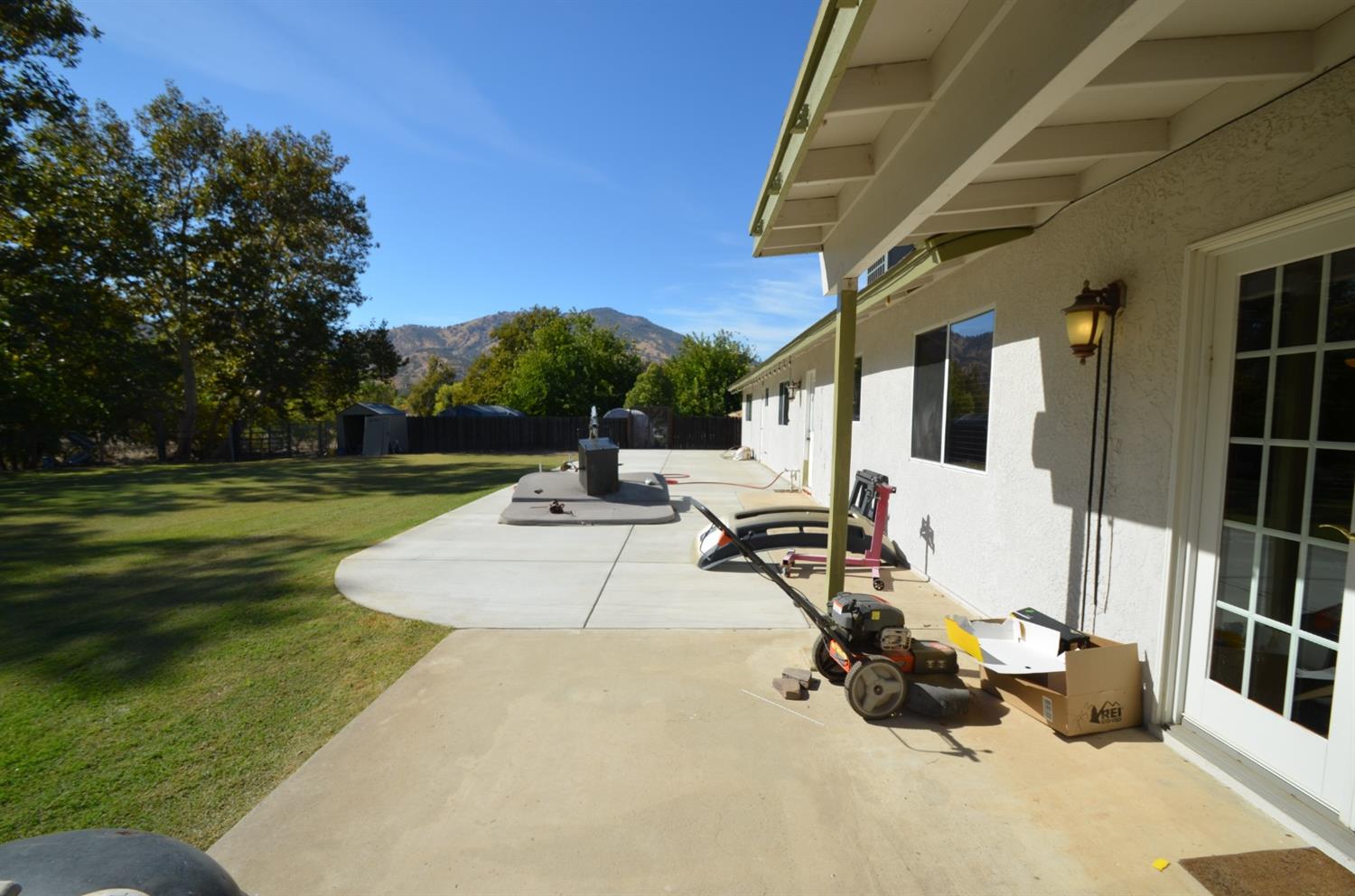 7453 Live Oak Drive Sanger, CA 93657 - Photo 26 of 28 a view of a big yard with an outdoor seating
