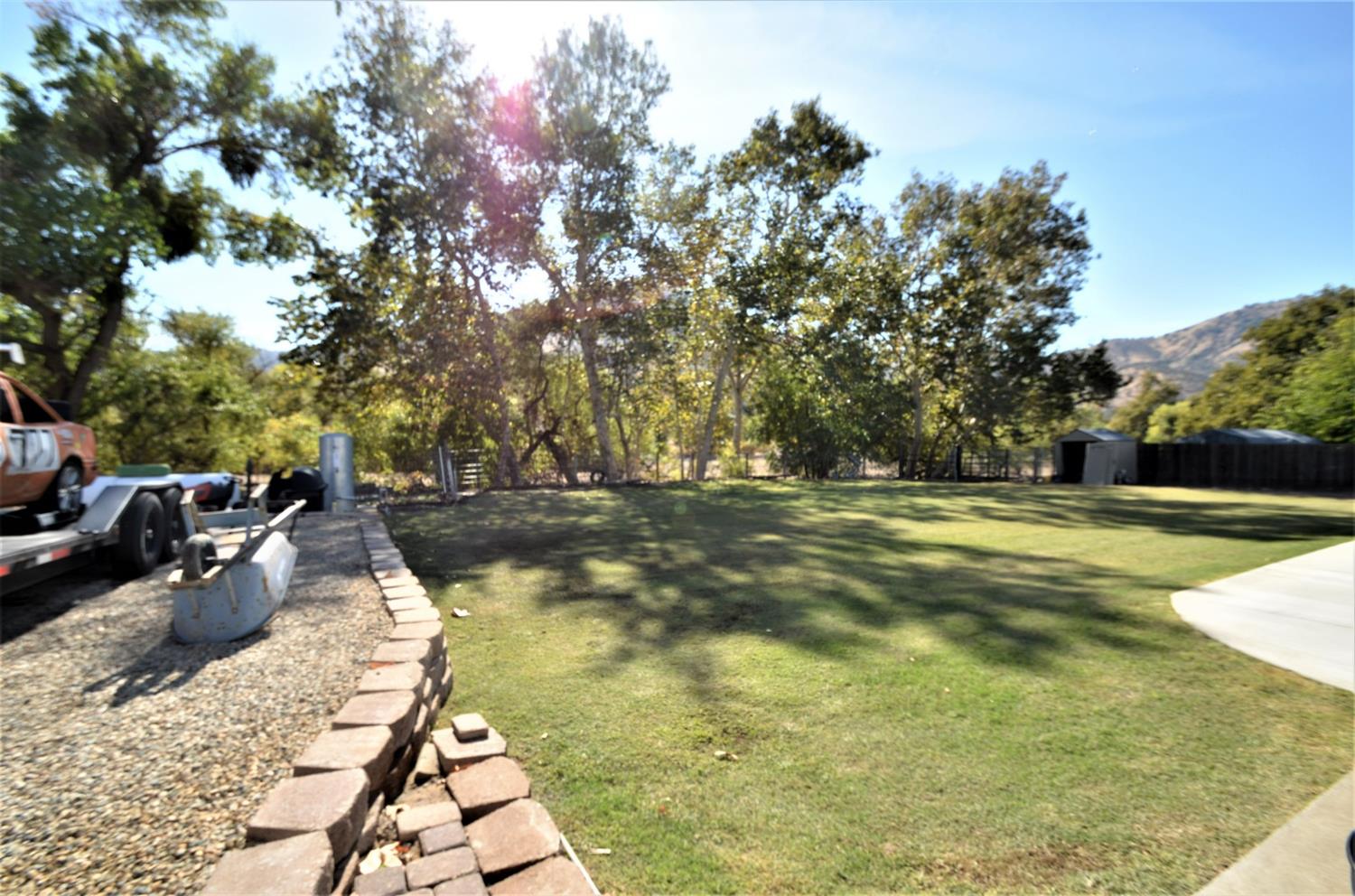 7453 Live Oak Drive Sanger, CA 93657 - Photo 27 of 28 a view of a swimming pool with a patio