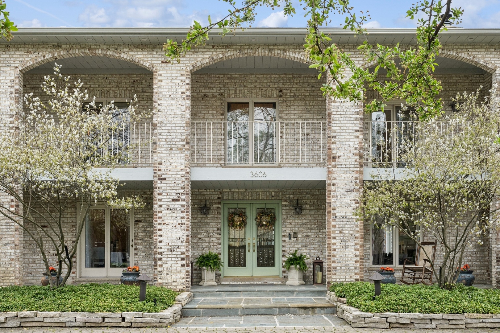 3606 Lawson Road Glenview, IL 60026 - Photo 1 of 62 front view of a building with a garden