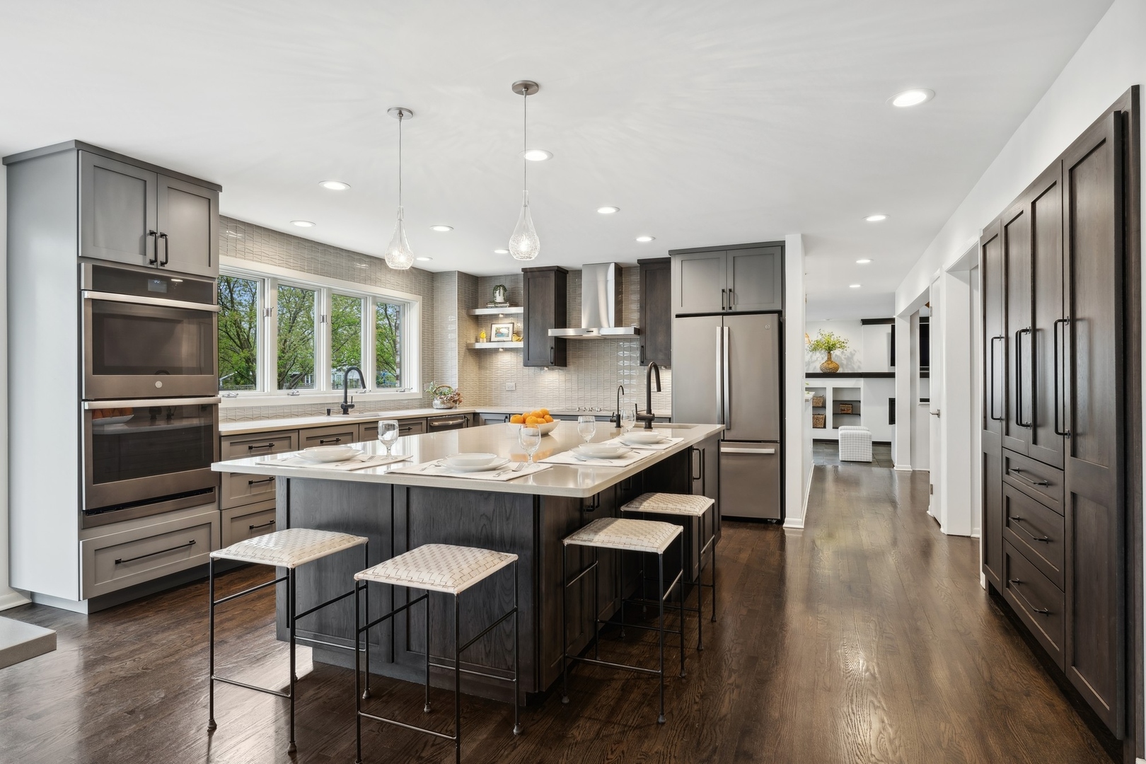 3606 Lawson Road Glenview, IL 60026 - Photo 12 of 62 a kitchen with refrigerator and chairs