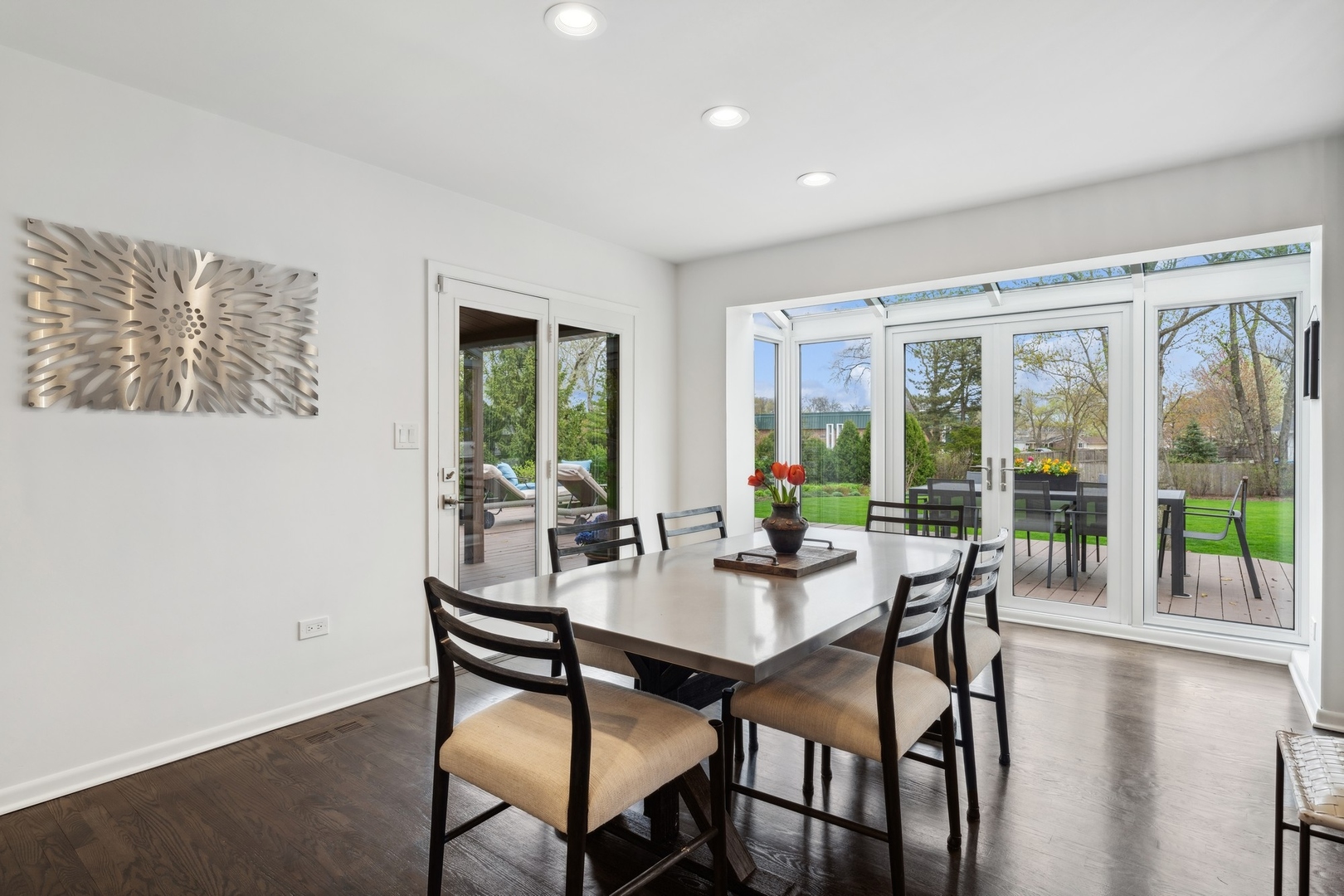3606 Lawson Road Glenview, IL 60026 - Photo 16 of 62 a view of a dining room with furniture window and wooden floor