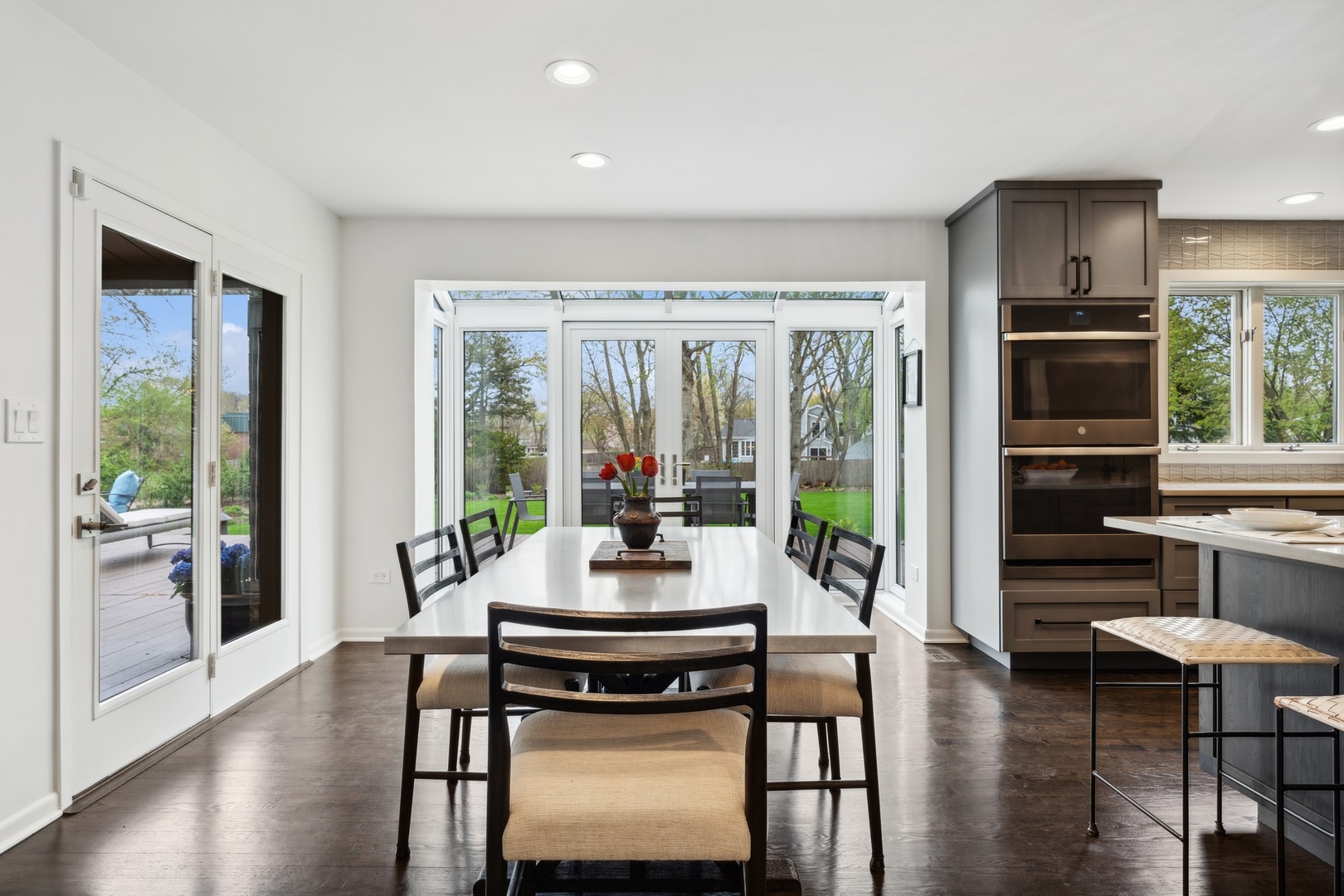 3606 Lawson Road Glenview, IL 60026 - Photo 17 of 62 a view of a dining room with furniture window and wooden floor
