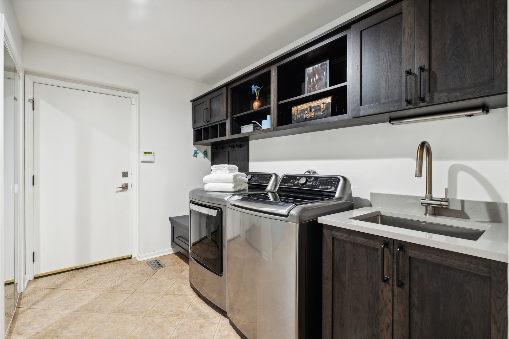 3606 Lawson Road Glenview, IL 60026 - Photo 19 of 62 a kitchen with stainless steel appliances granite countertop a stove and a sink