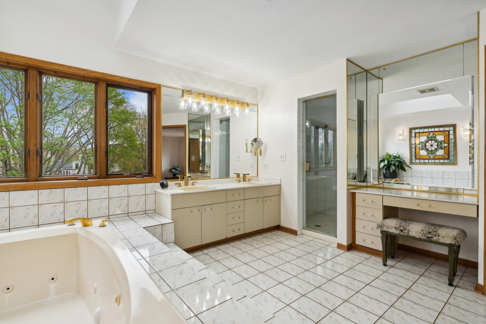 3606 Lawson Road Glenview, IL 60026 - Photo 27 of 62 a large white bathroom with a large tub sink shower and mirror