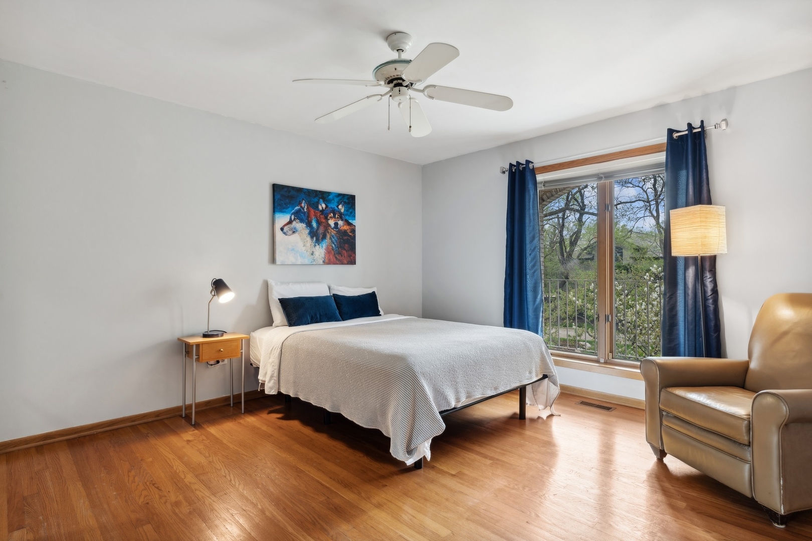 3606 Lawson Road Glenview, IL 60026 - Photo 30 of 62 a bedroom with a bed and a couch