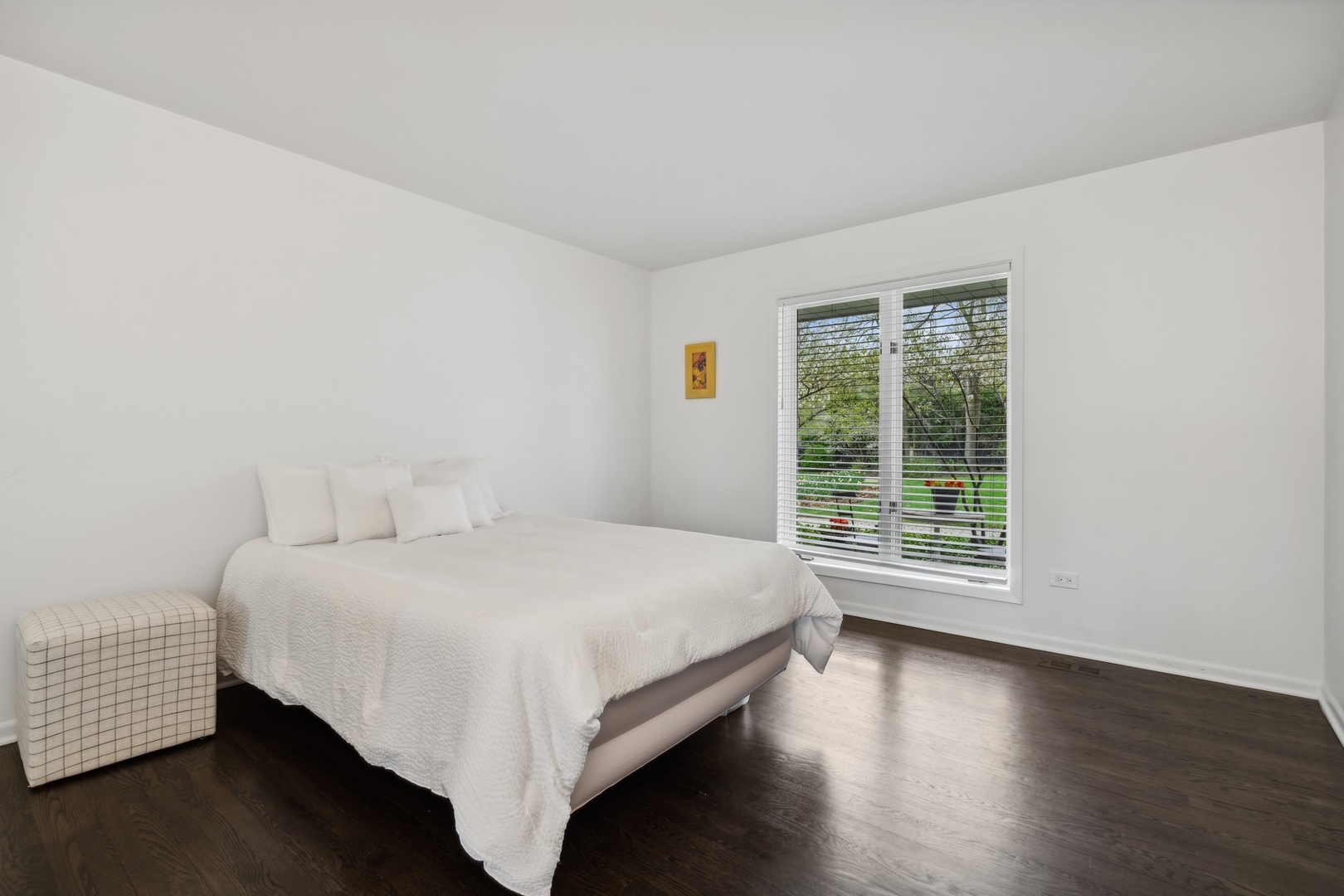 3606 Lawson Road Glenview, IL 60026 - Photo 34 of 62 a large bed sitting in a bedroom next to a window