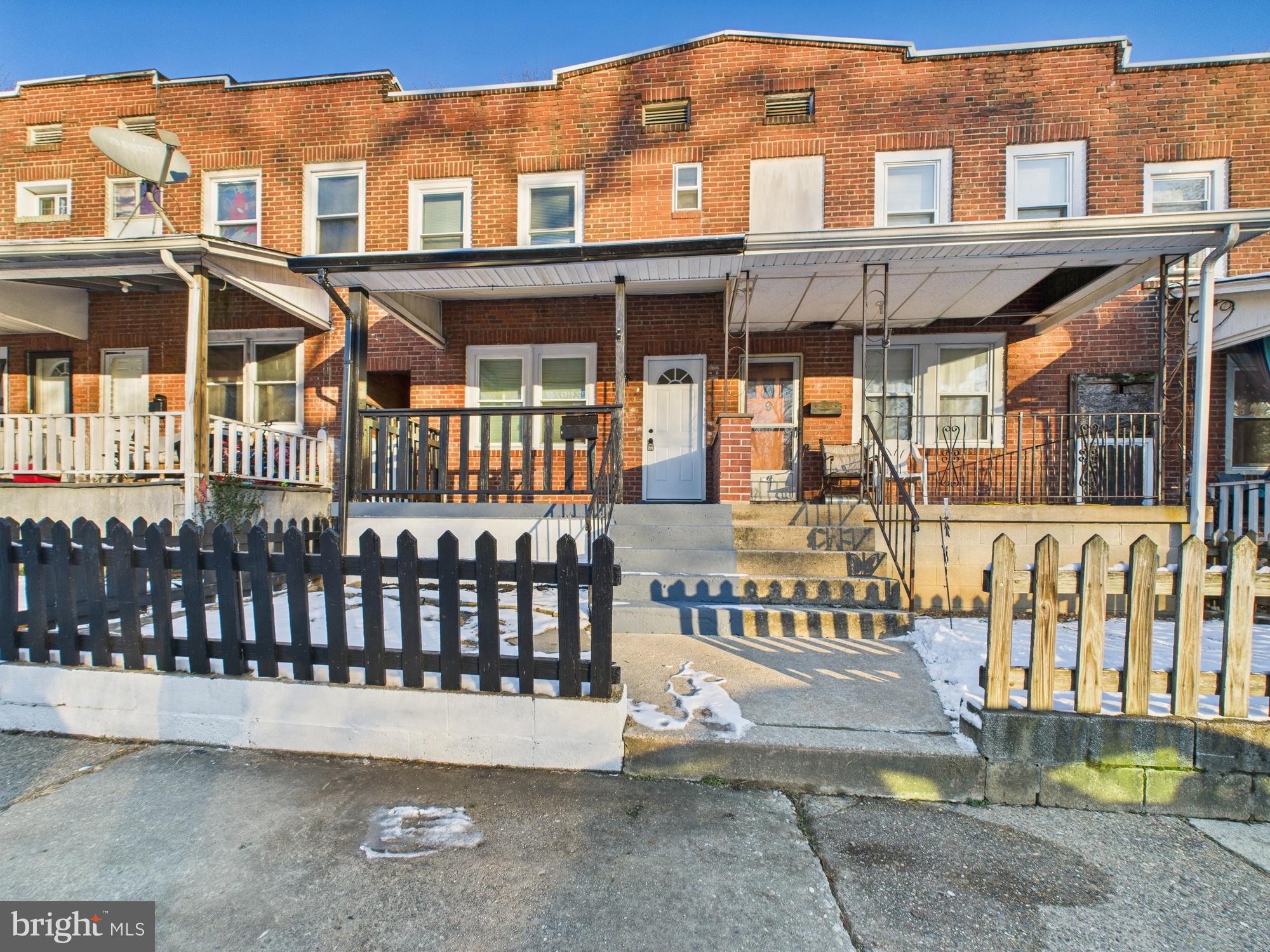 11 Denham Avenue Claymont, DE 19703 - Photo 1 of 28 Charming brick townhouse with inviting porch.