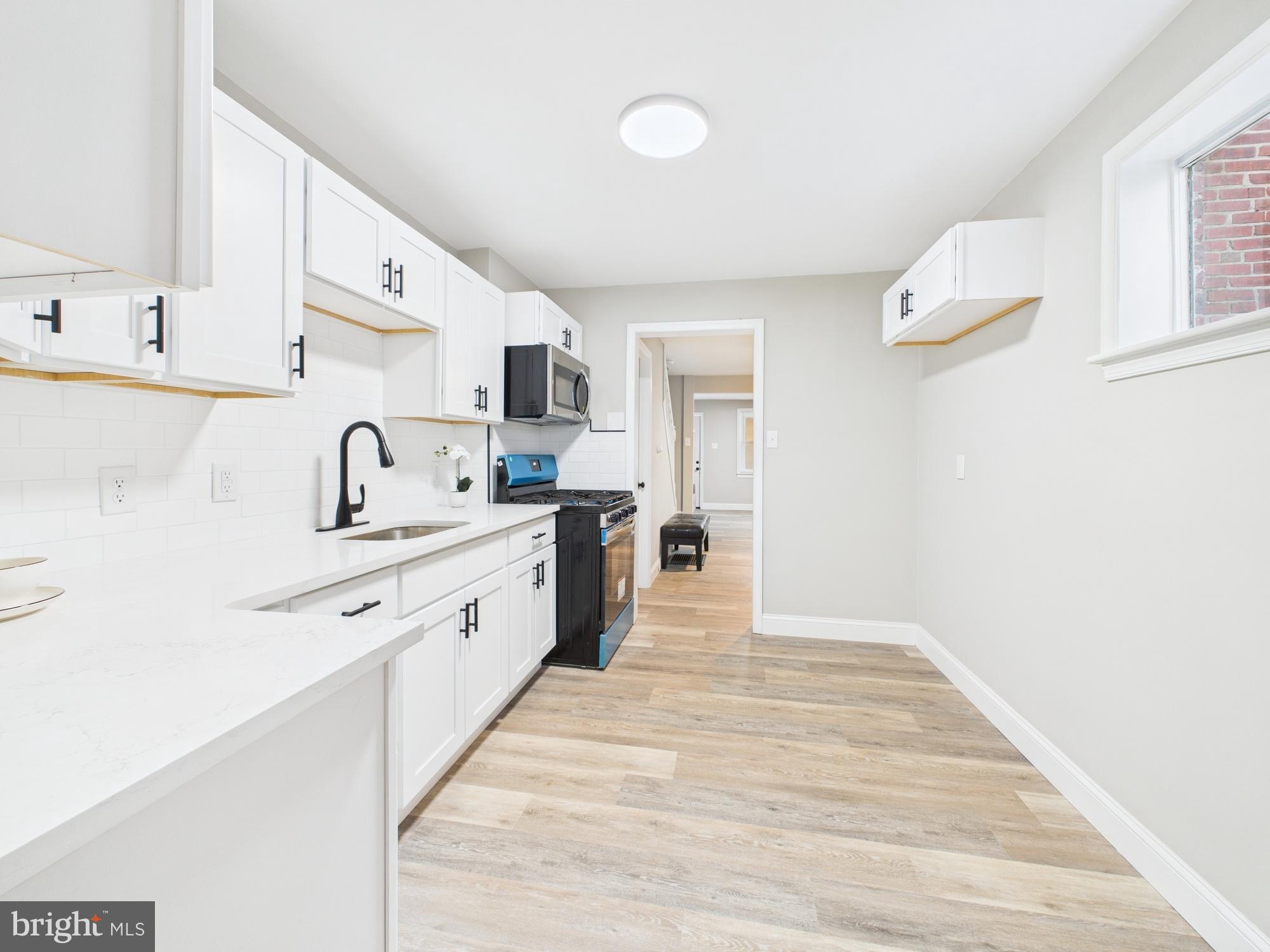 11 Denham Avenue Claymont, DE 19703 - Photo 12 of 28 Modern kitchen with sleek finishes.