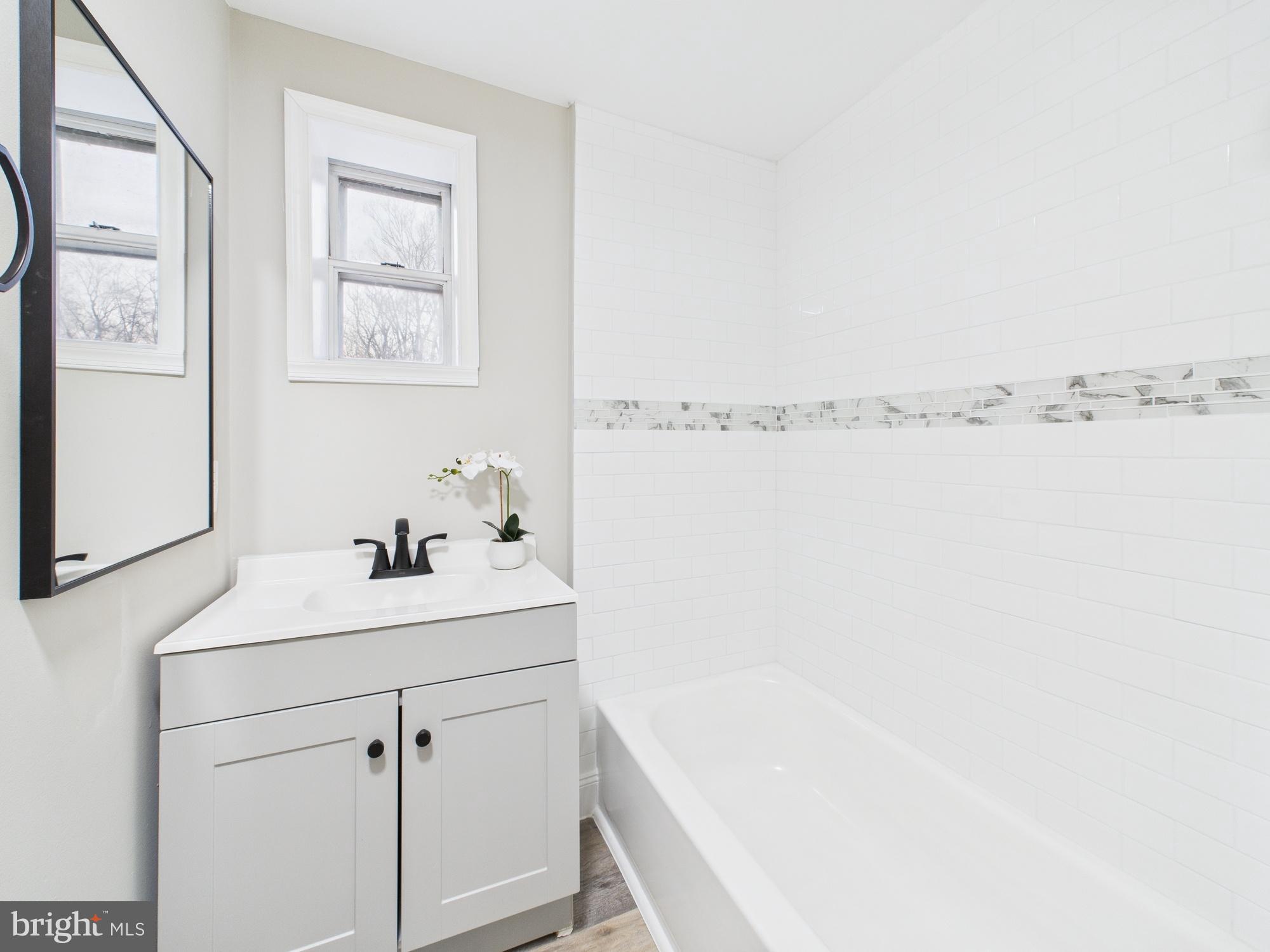 11 Denham Avenue Claymont, DE 19703 - Photo 4 of 28 Modern bathroom with sleek design, second floor.