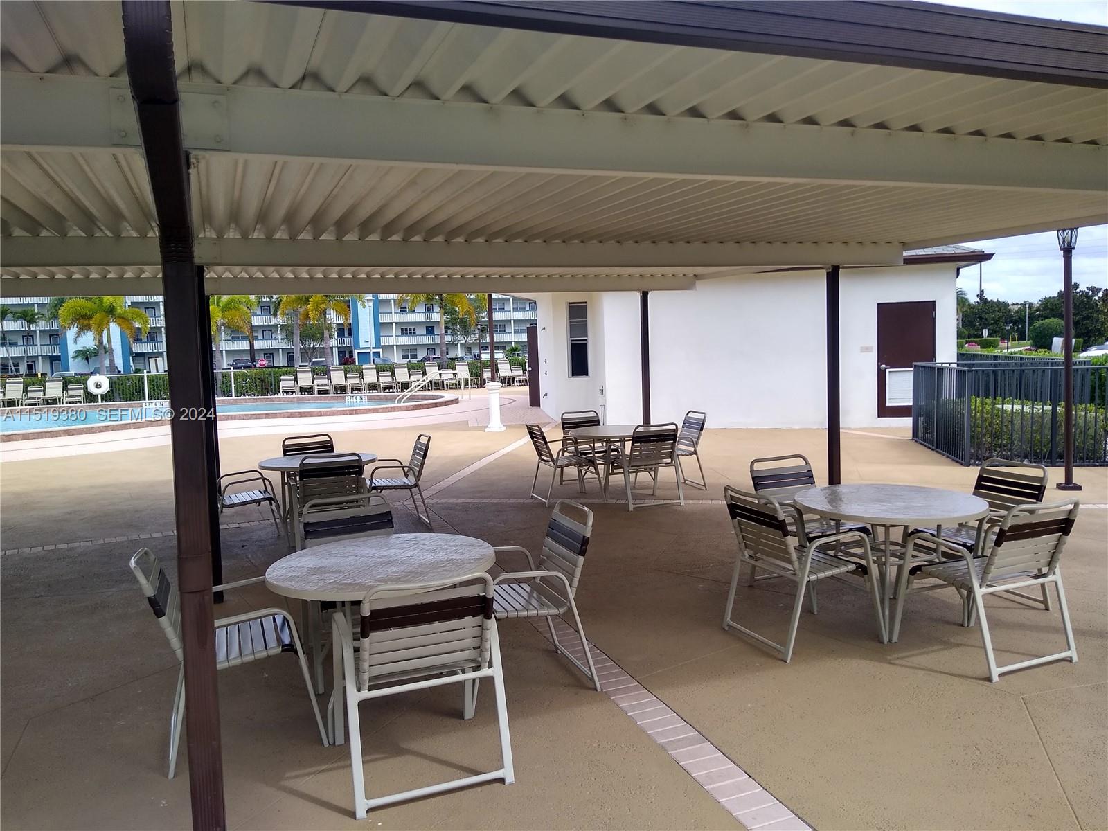 1033 Lincoln B, Unit 1033 Boca Raton, FL 33434 - Photo 22 of 26 pool Area