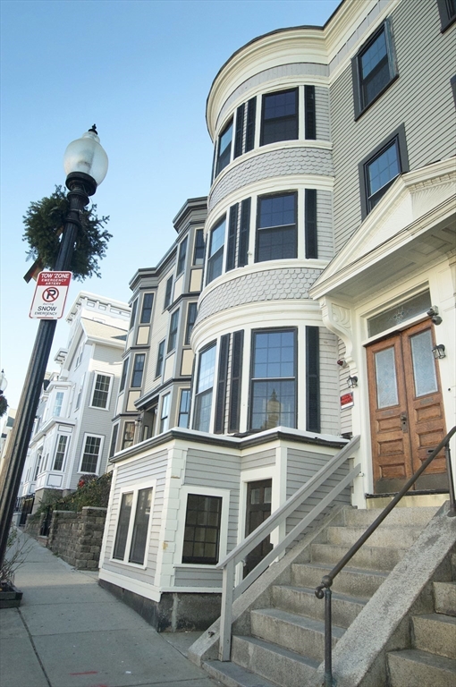 501 East Broadway, Unit 2 Boston, MA 02127 - Photo 7 of 8 a building with glass windows and door