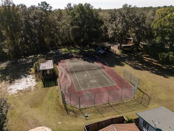 a view of a lake with a yard