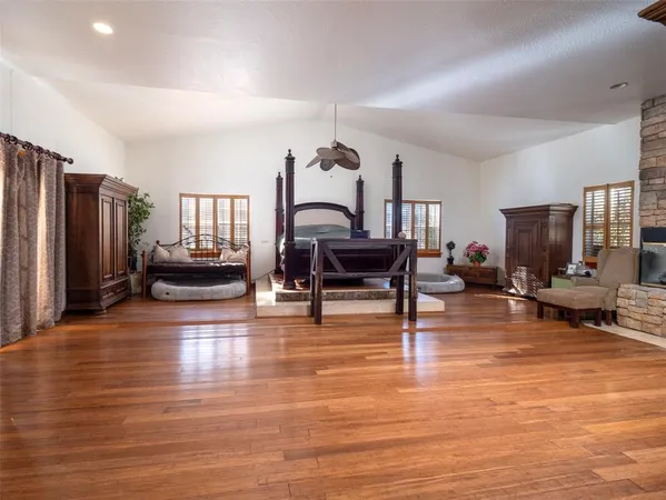 a view of a bathroom with a sink a mirror and a vanity