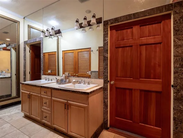 a living room with furniture a wooden floor and a fireplace