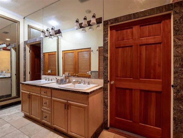 a living room with furniture a wooden floor and a fireplace