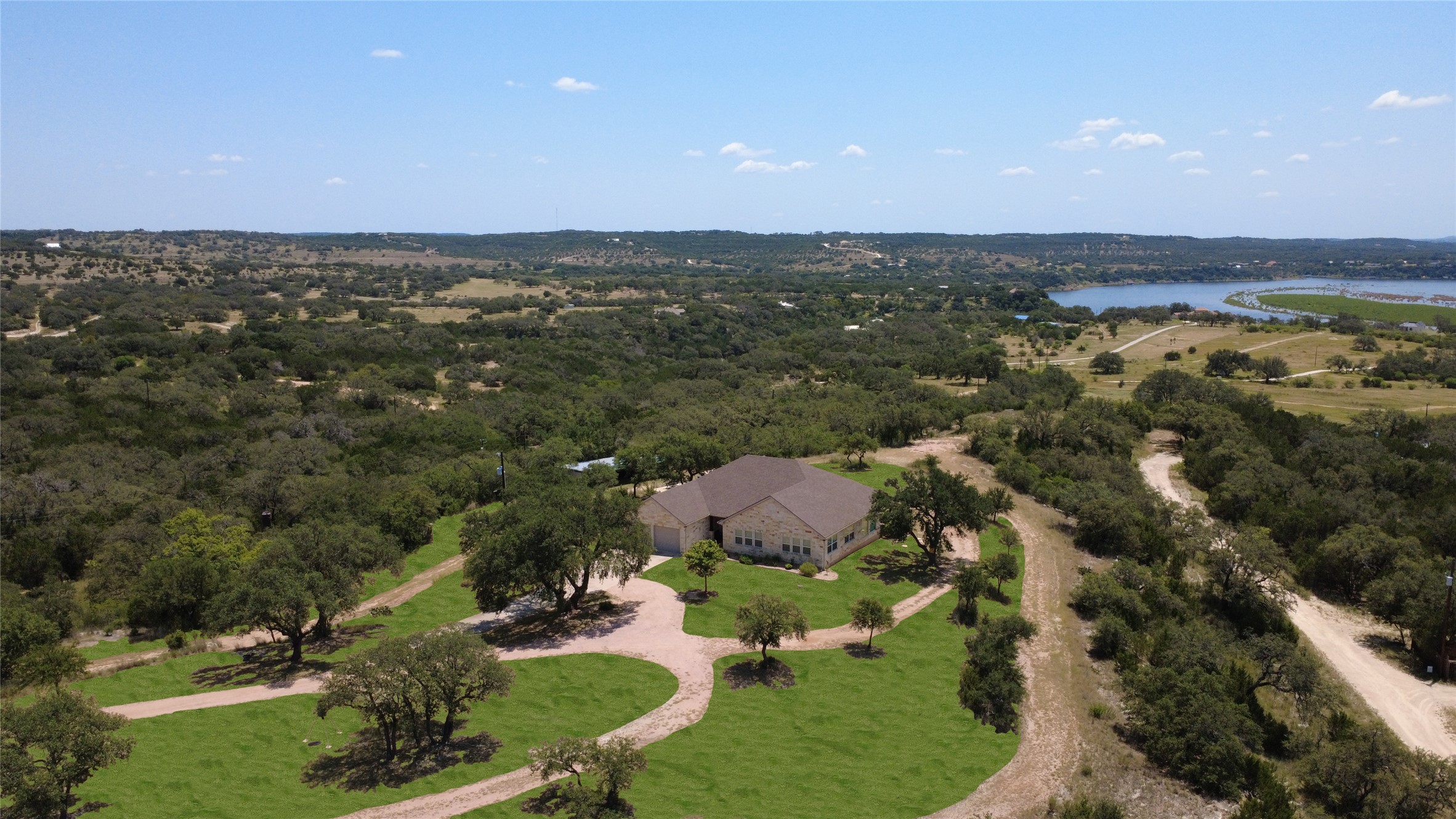 28701 Valley Road Marble Falls, TX 78654 - Photo 1 of 35 an aerial view of multiple house