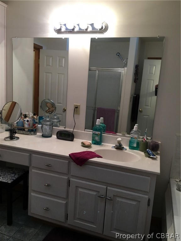 2573 Wright Road Saluda, VA 23149 - Photo 17 of 30 Double mirror, makeup vanity and sink in maser bath