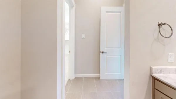 a view of an entryway with wooden floor