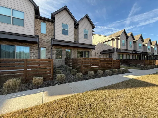 a front view of a house with swimming pool