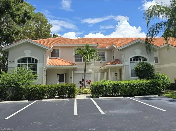 front view of a house with a street