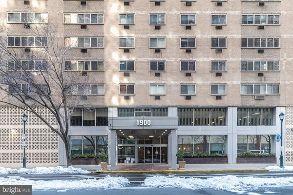 a front view of a building with a street