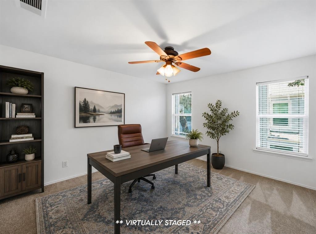 2815 Welborn Street, Unit 101 Dallas, TX 75219 - Photo 19 of 29 Bright room featuring carpeted flooring and white walls