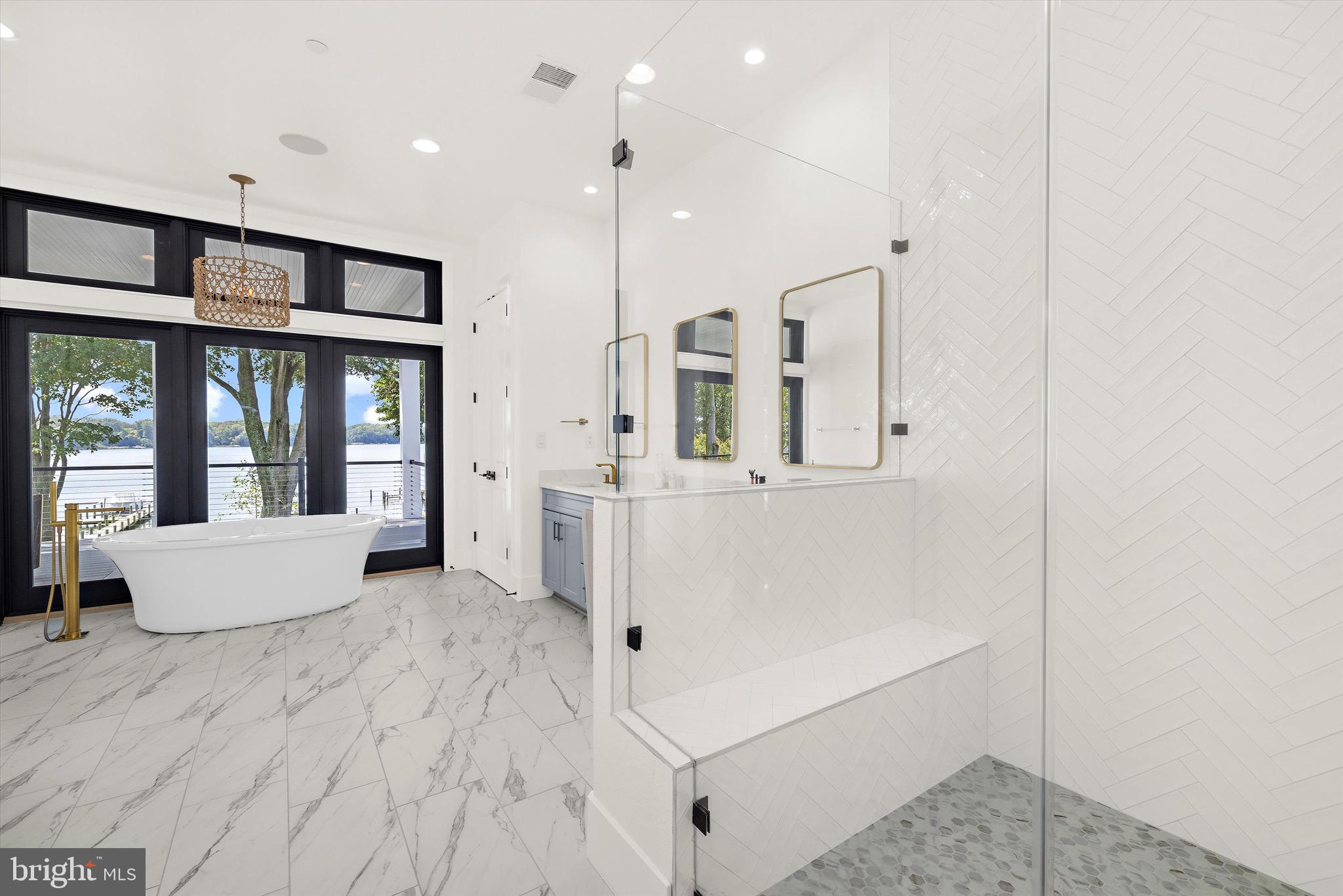 12606 Newgate Road Rockville, MD 20850 - Photo 14 of 43 a large white room with wooden floor