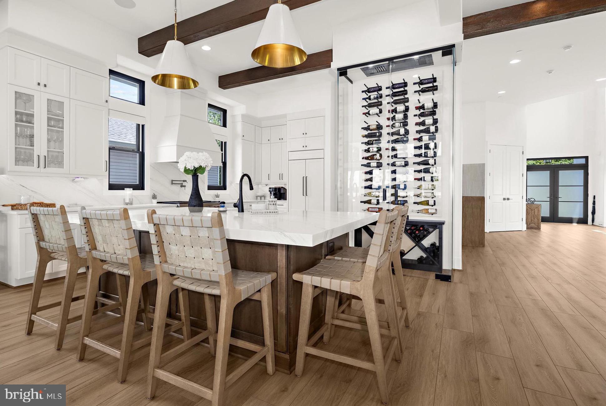12606 Newgate Road Rockville, MD 20850 - Photo 3 of 43 a view of a dining room with furniture and wooden floor