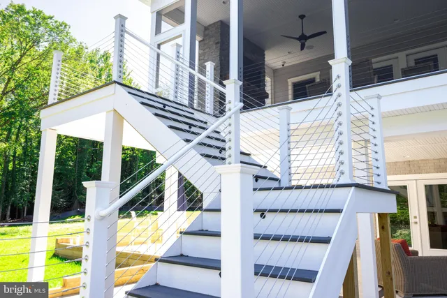 a view of swimming pool with two chairs