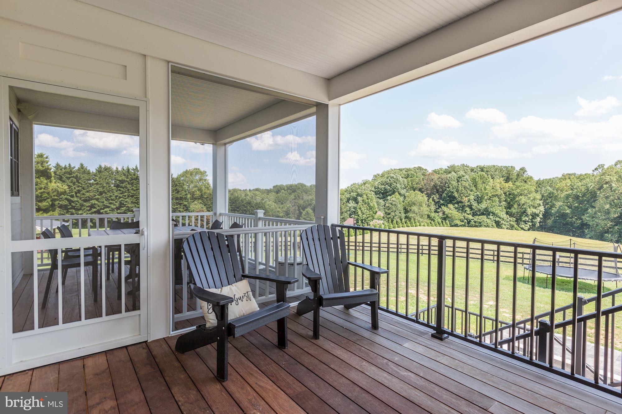 12606 Newgate Road Rockville, MD 20850 - Photo 33 of 43 a view of a two chairs in the balcony