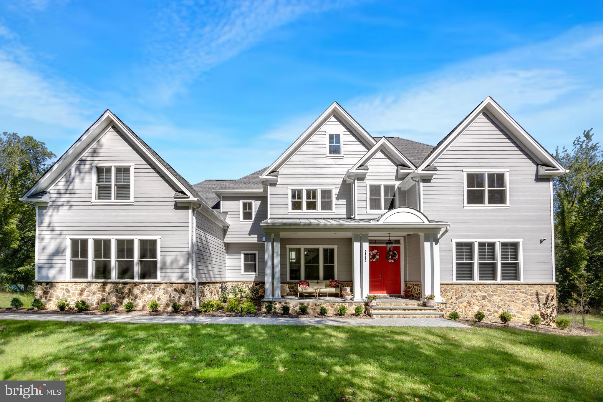12606 Newgate Road Rockville, MD 20850 - Photo 35 of 43 a front view of a house with a yard