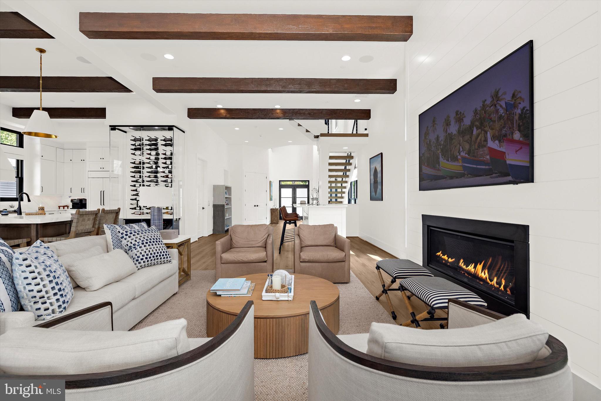 12606 Newgate Road Rockville, MD 20850 - Photo 6 of 43 a living room with furniture and a fireplace