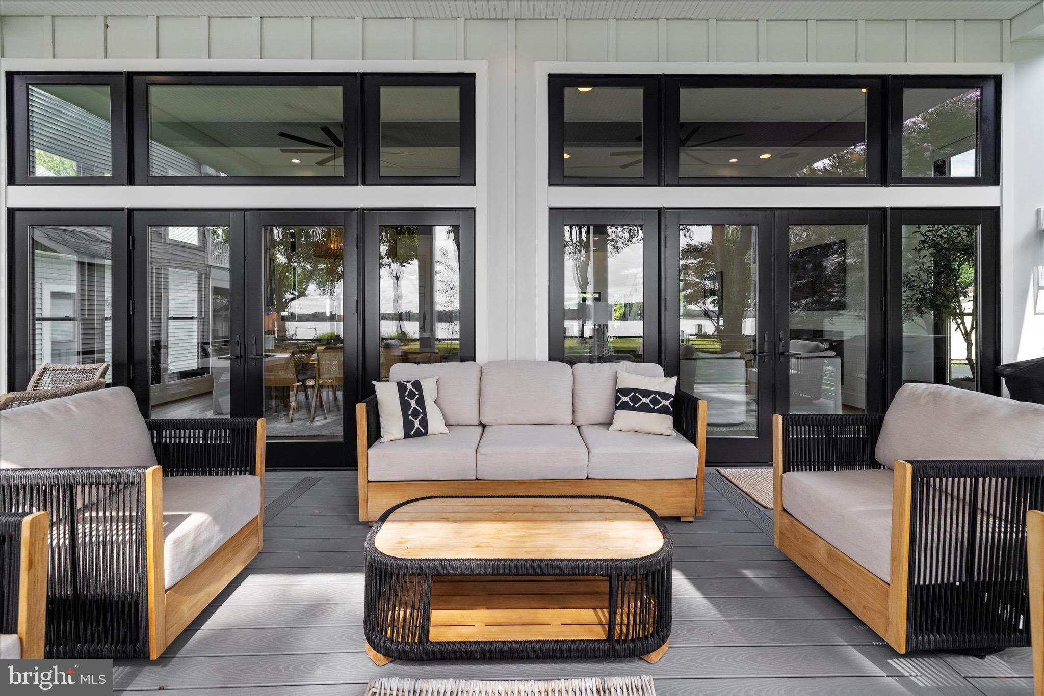 12606 Newgate Road Rockville, MD 20850 - Photo 10 of 43 a outdoor living space with furniture and a window