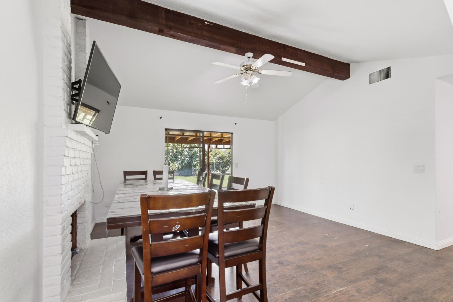 7208 7th Street Rio Linda, CA 95673 - Photo 6 of 41 a view of a dining room with furniture and chandelier